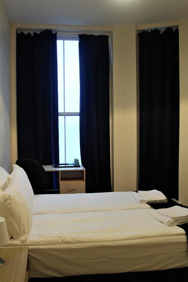 Pier 61 Guest Accommodation Hastings Bagian luar foto